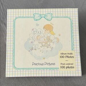 Precious Moments photo album from 1997 - in original new condition.